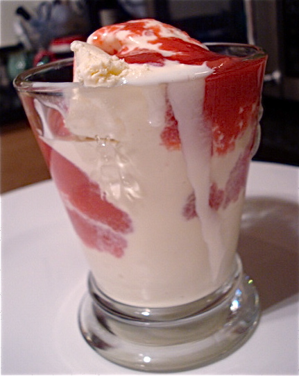 Vanilla ice cream with warm peachberry drizzle