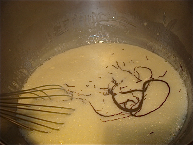 When the egg mixture is warm, drizzle in the melted chocolate