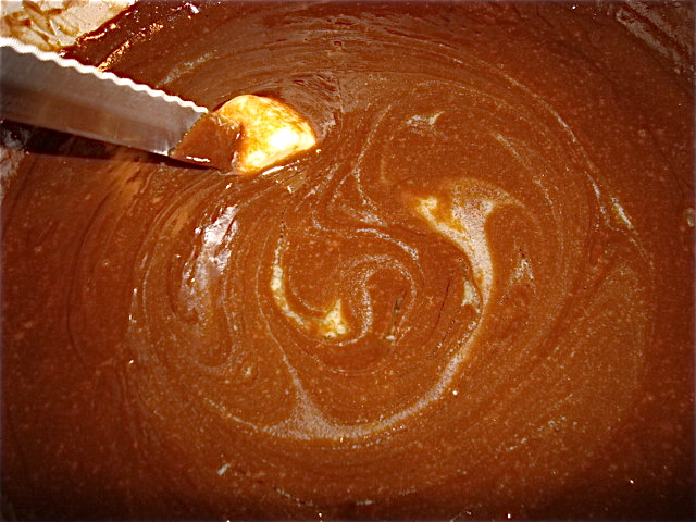 Stir in the butter and let cool for at least a half an hour before freezing