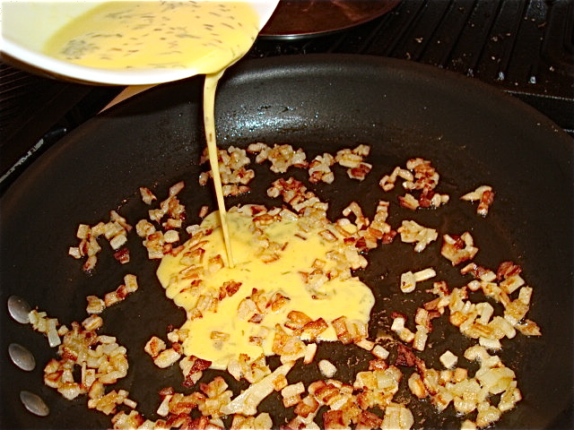 Pour in the egg when your potatoes are nice and brown