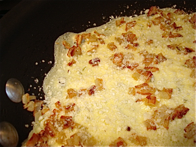 Sprinkle on a layer of Parmesan cheese