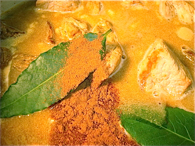 Add the garlic, bay leaves, and cinnamon