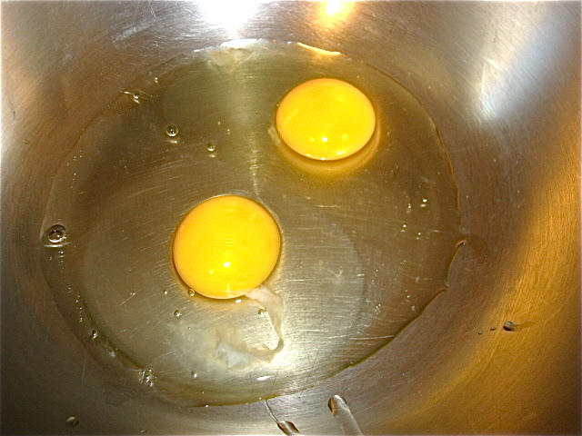 Crack two jumbo eggs into a large mixing bowl