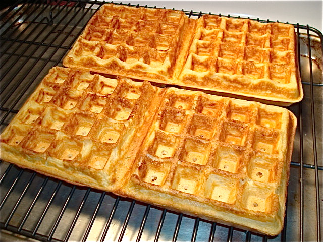 Keep the waffles warm in the oven on a rack set over a sheet pan