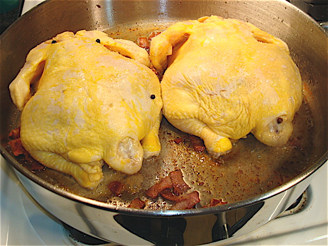 Cornish hens, browning in bacon fat