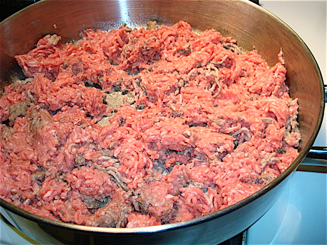 Break up the meat with a wooden spoon
