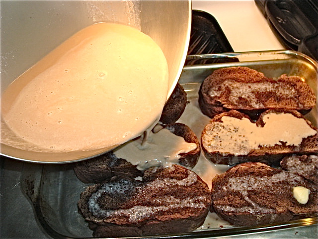 Pour the custard mixture over the bread