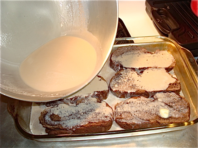 Pour the custard mixture over the bread