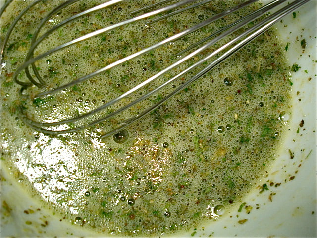 Whisk the egg and herb mixture to combine