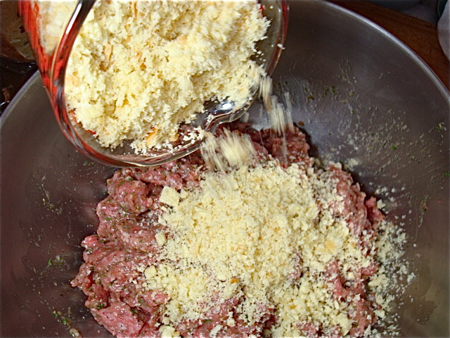 Toss in about half of the breadcrumbs and mix