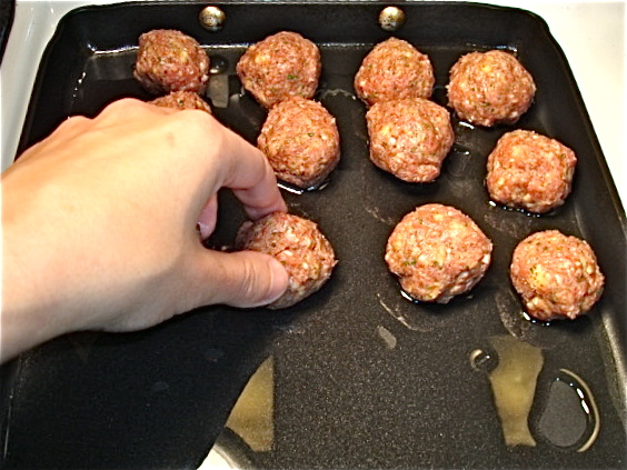 Add the meatballs to the hot pan