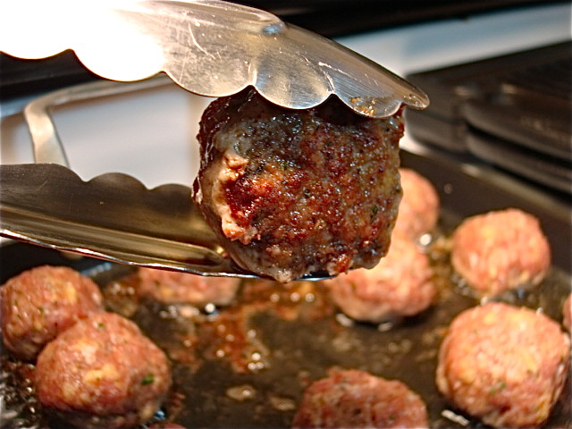 When your meatballs look like this on the bottom, start flipping them