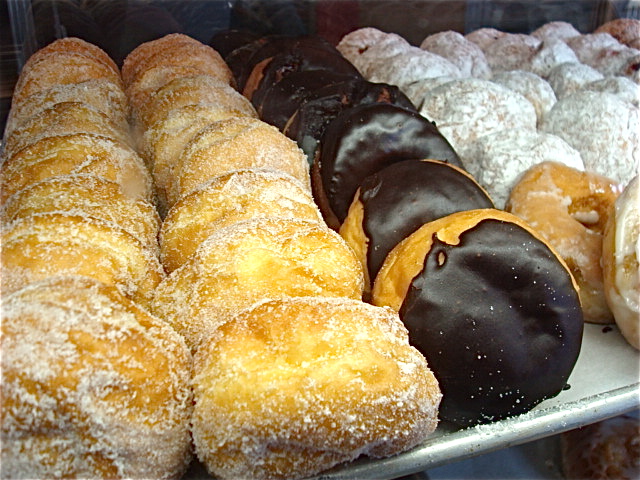 A tray of fresh doughnuts