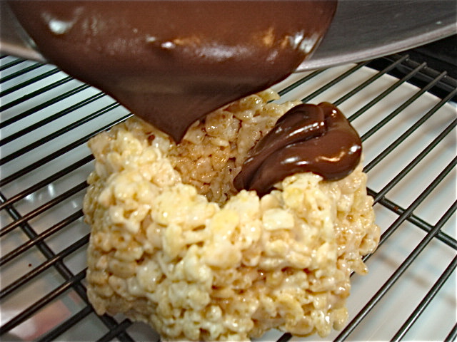 Pour the chocolate over the treats