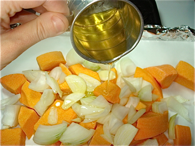 Drizzle the olive oil over the veggies