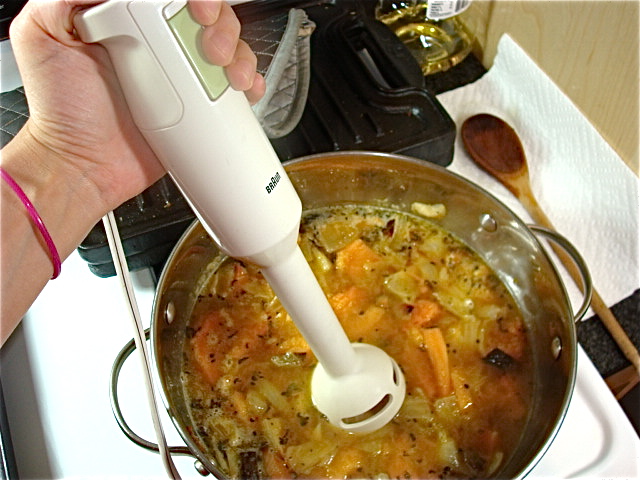Put the stick blender in the pot