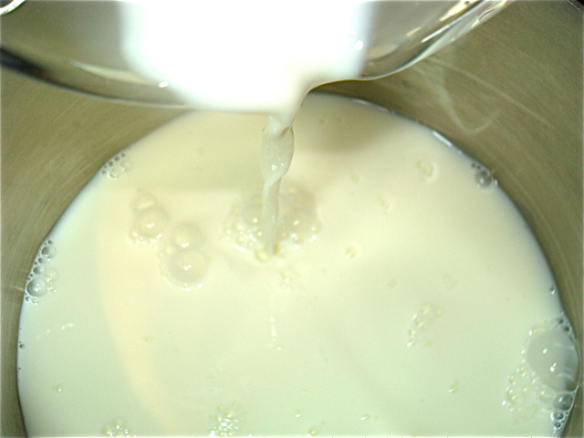 Add the milk and cream to the pot