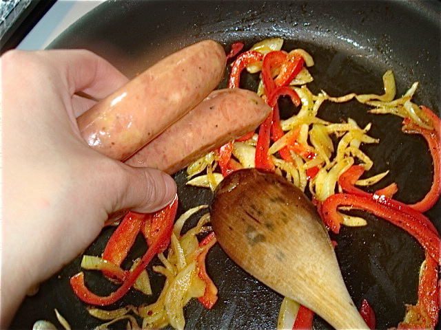 Add the sausages to the pan