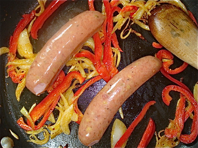 Add the sausages to the pan