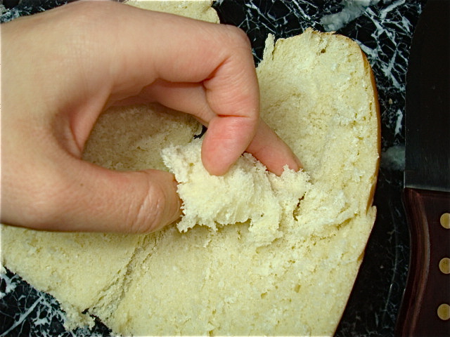 Scoop out some of the bread