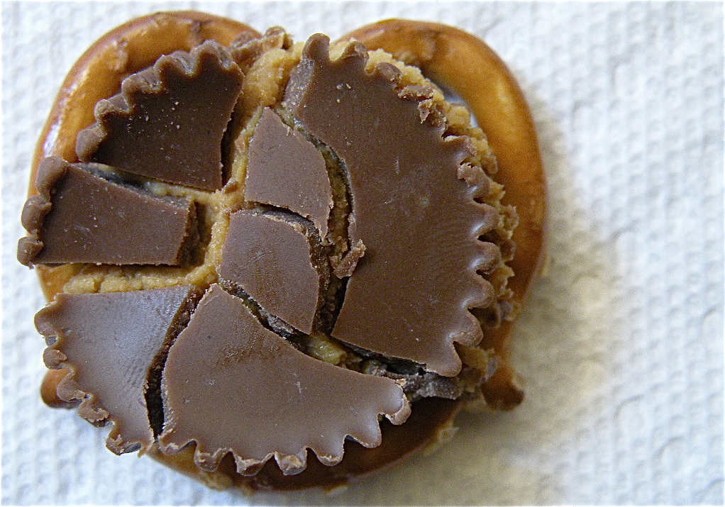 Put the peanut butter cup on top of a mini pretzel