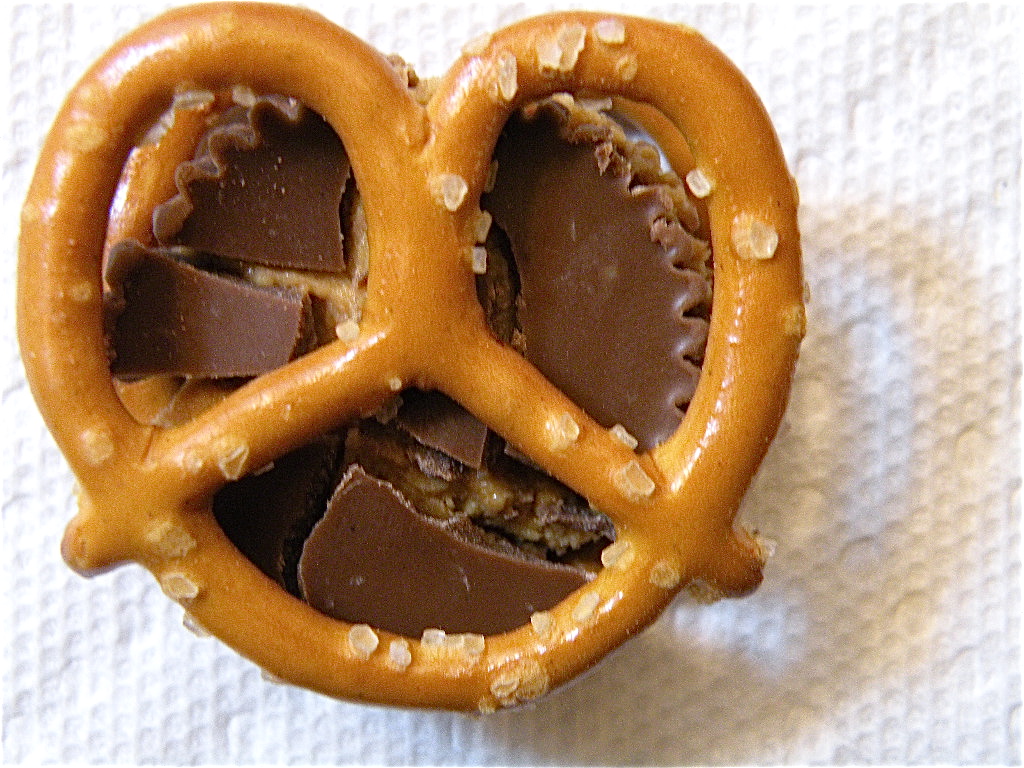 Set a pretzel on top of the peanut butter cup