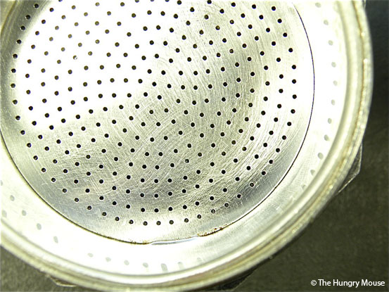 How to make stovetop espresso: Set the filter basket in place