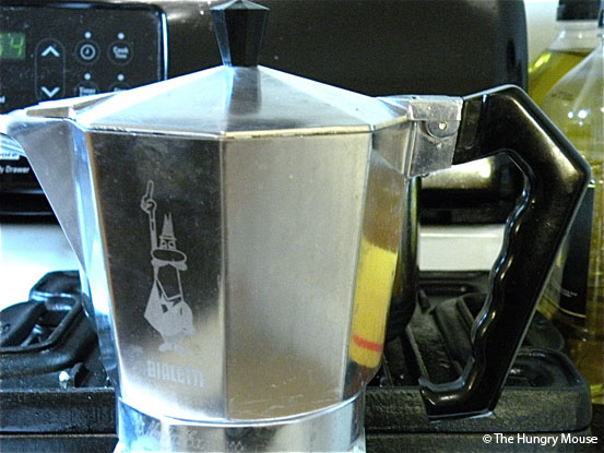 How to make stovetop espresso: Set the pot on the stove